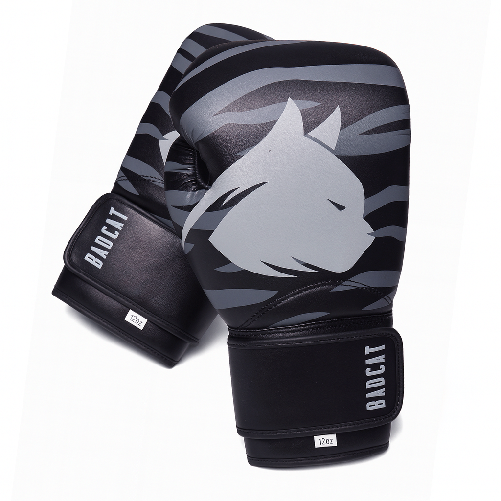 Black and gray boxing gloves with a logo on a white background